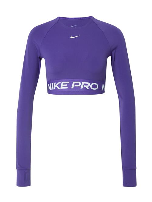 Se NIKE Funktionsbluse 'PRO'  lilla / hvid ved About You