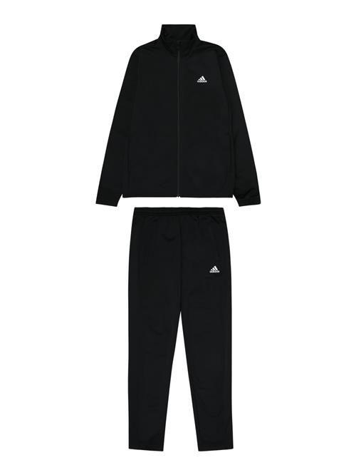 Se ADIDAS SPORTSWEAR Træningsdragt 'Essentials'  sort / hvid ved About You