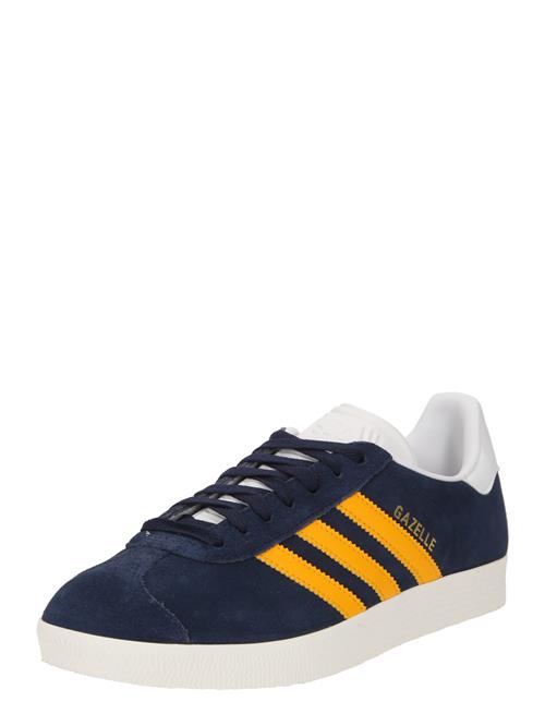 Se ADIDAS ORIGINALS Sneaker low 'GAZELLE'  mørkeblå / guld / orange / hvid ved About You