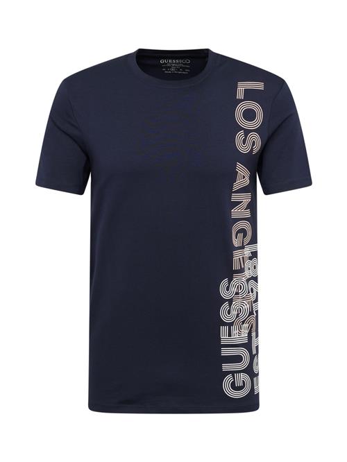 Se GUESS Bluser & t-shirts  sand / navy / hvid ved About You