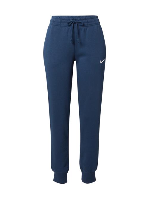 Se Nike Sportswear Bukser 'Phoenix Fleece'  navy / hvid ved About You