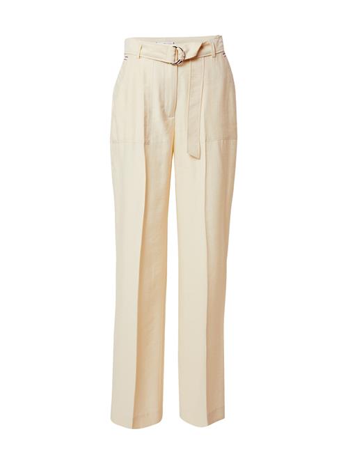 Se TOMMY HILFIGER Bukser med fals 'TOMMY HILFIGER X ABOUT YOU WL BELTED PANT'  beige ved About You