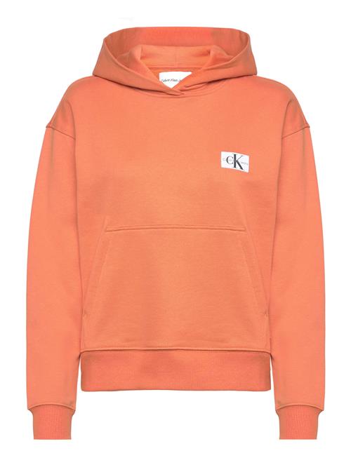 Se Calvin Klein Jeans Woven Label Hoodie Calvin Klein Jeans Orange ved Booztlet