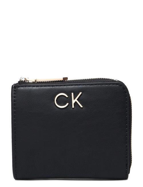 Se Calvin Klein Re-Lock Za Wallet Sm Calvin Klein Black ved Booztlet