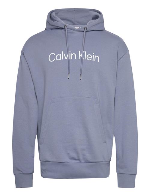 Se Calvin Klein Hero Logo Comfort Hoodie Calvin Klein Blue ved Booztlet