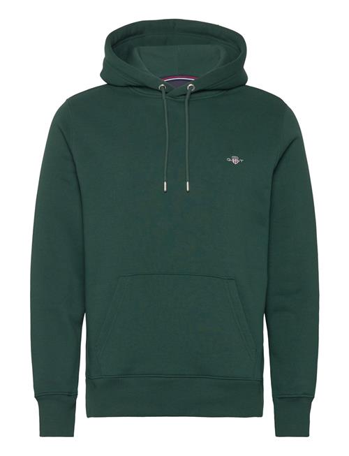 Se GANT Reg Shield Hoodie GANT Green ved Booztlet