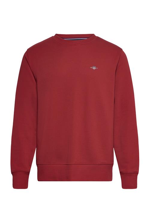 Se GANT Reg Shield C-Neck Sweat GANT Red ved Booztlet