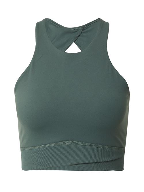 Se NIKE Sports-BH  mørkegrøn ved About You