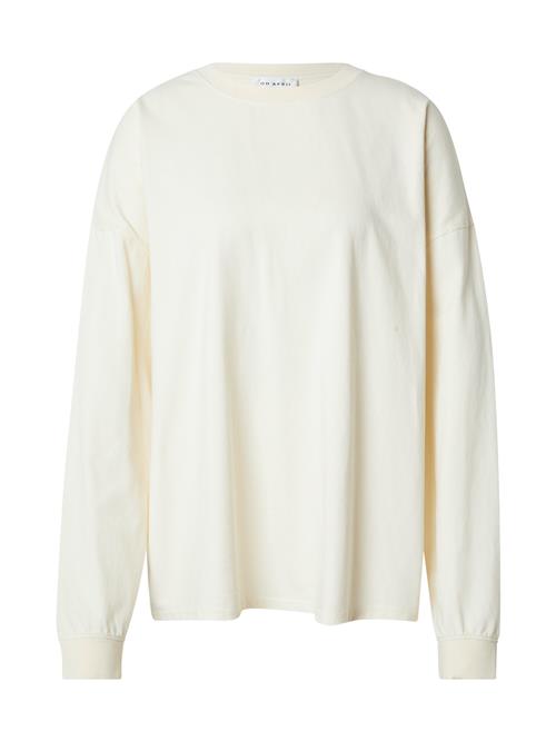 Se OH APRIL Oversized bluse 'Yelina'  lysebeige / lysegrøn ved About You