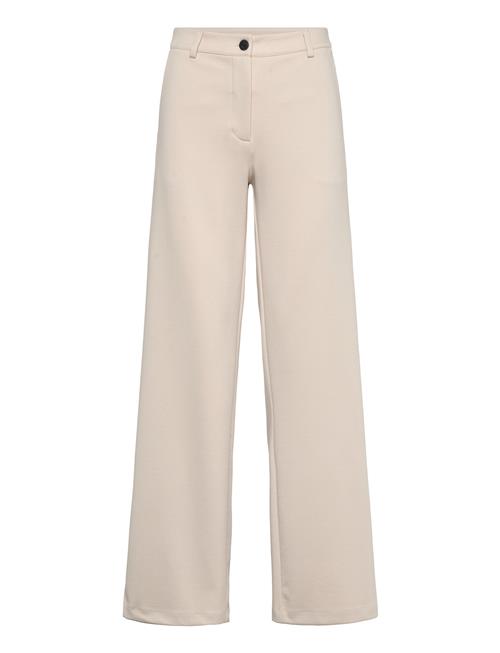 Pants From Freequent In A Soft Material. The Pants Have A Simple Silhouette With FREE/QUENT Cream