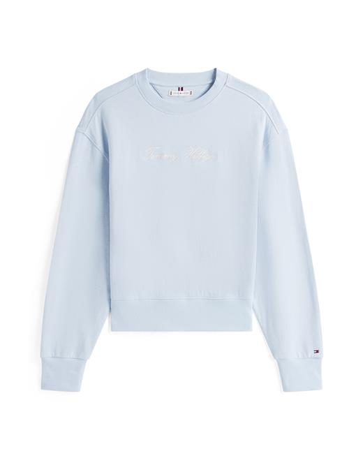 Se TOMMY HILFIGER Sweatshirt  lyseblå / hvid ved About You