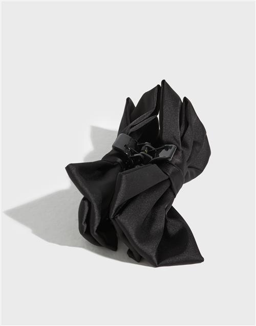 Se BECKSÖNDERGAARD - Sort - Minda Bow Hair Claw ved Nelly