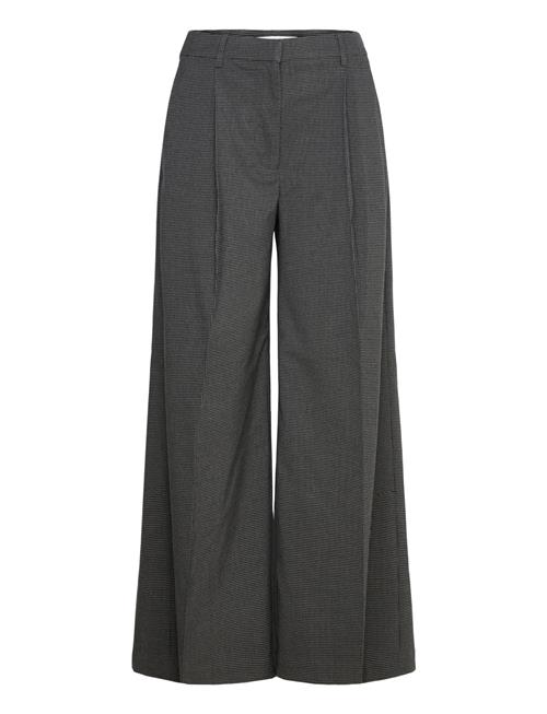 Lupon Munthe Grey
