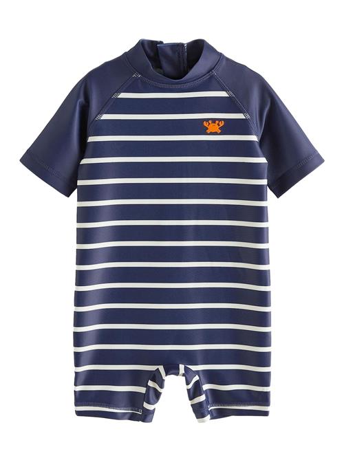 Next UV-beskyttelse  navy / orange / hvid