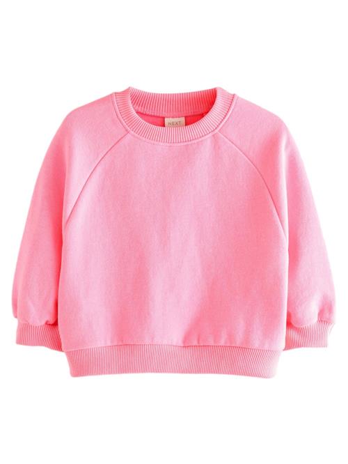 Se Next Sweatshirt  pink hos About You