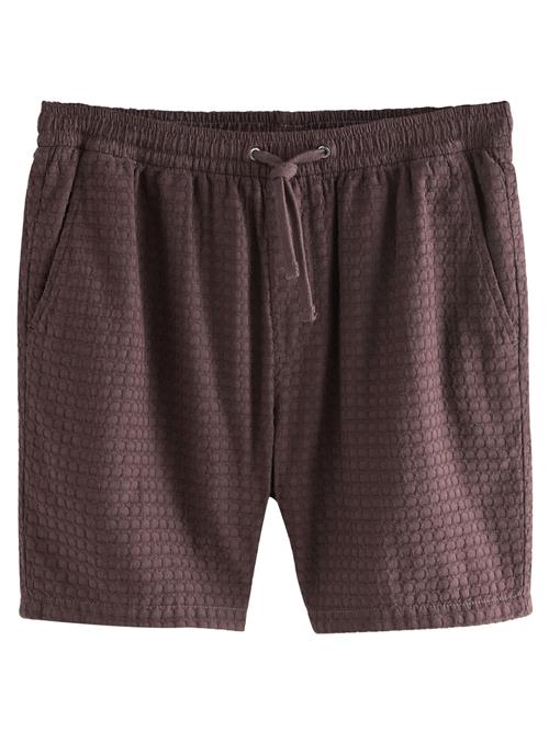 Next Bukser med lægfolder  burgunder / mørkerød