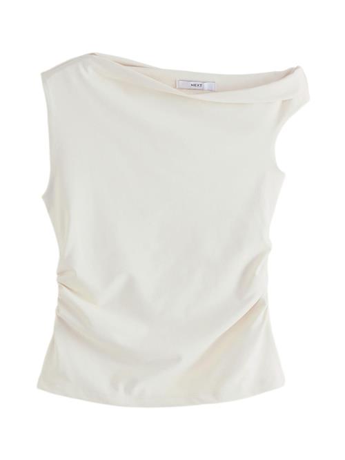 Next Overdel  lysebeige