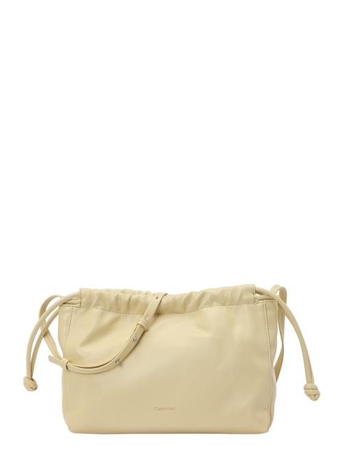 Calvin Klein Posetaske  pastelgul