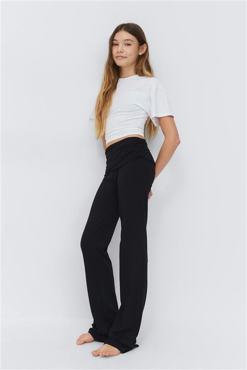 Gina Tricot - Y low waist flare trousers - Yoga pants til piger 9–14 år - Sort - 146/152 - Pige
