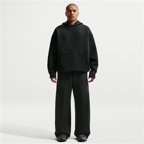 Nike Tech-fleecebukser med åben kant og løstsiddende pasform til mænd - sort