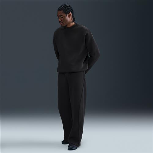 Nike Tech-fleecebukser med åben kant og løstsiddende pasform til mænd - sort