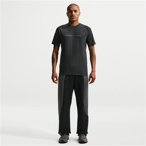 Nike Tech-fleecebukser med farveblok og åben kant til mænd - sort