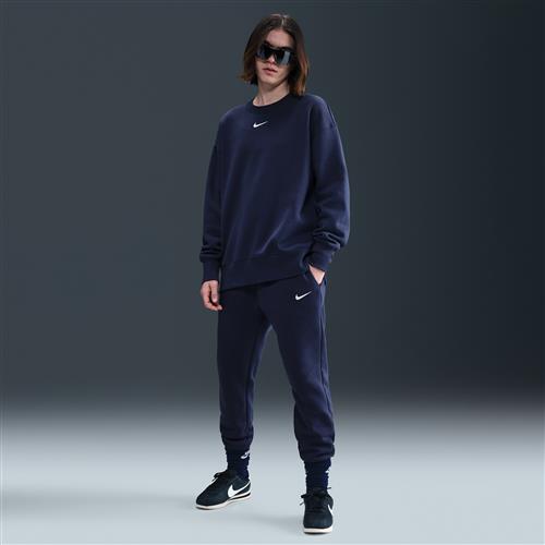 Nike Phoenix Fleece-sweatpants med mellemhøj talje til kvinder - blå