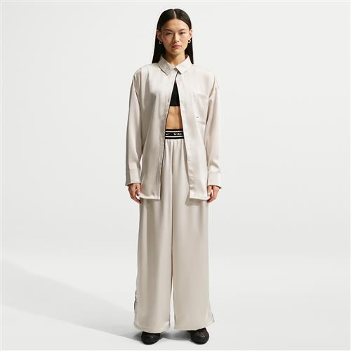 Løse Nike -satinbukser med mellemhøj talje til kvinder - grå