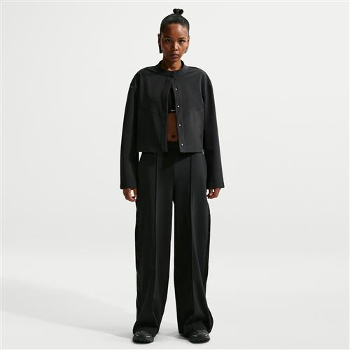 Løstsiddende Nike 24.7 PerfectStretch Dri-FIT Tearaway-bukser med høj talje til kvinder - sort