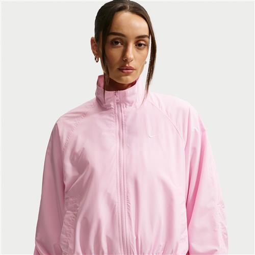 Oversized Nike UV-løbejakke til kvinder - Pink