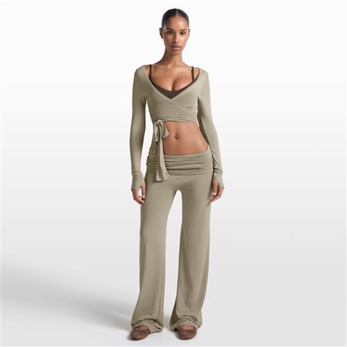 NikeSKIMS Stretch Knit-bukser med brede ben til kvinder - sort