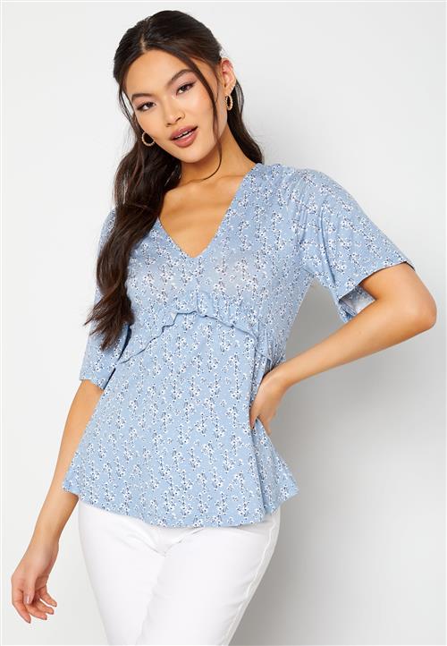 Happy Holly Kora flounce top