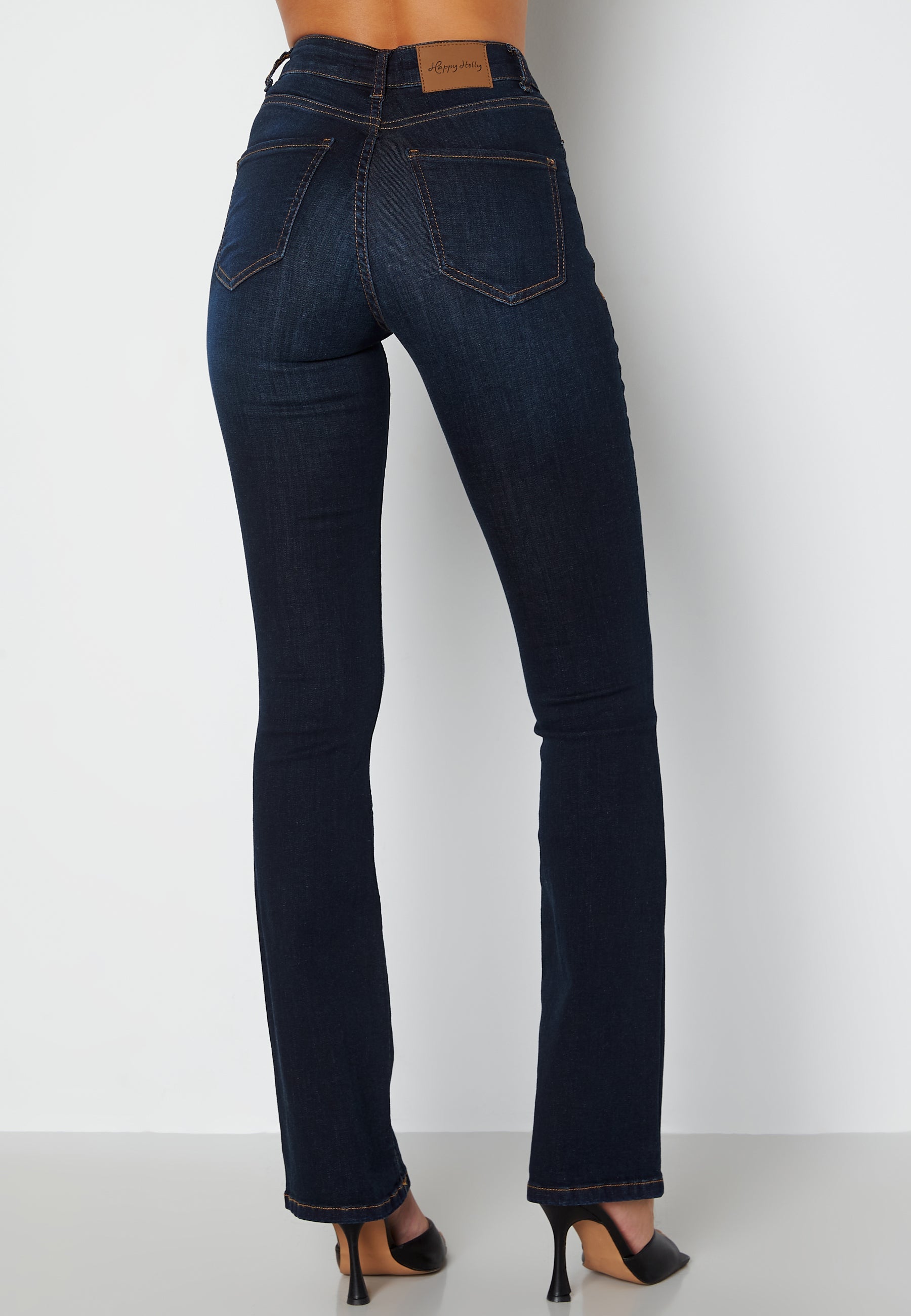 Happy Holly Francis, high flared