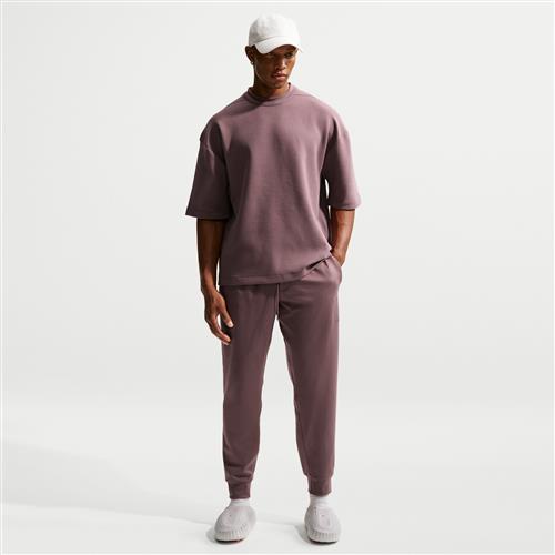 Nike Primary NanoKnit Dri-FIT Performance-joggers med UV-beskyttelse til mænd - lilla