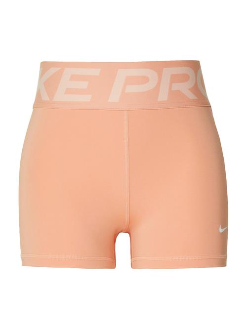 NIKE Sportsbukser  abrikos / hvid