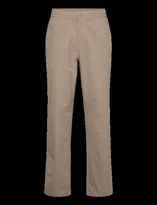 FILA | High Tide Relaxed 4-Way Stretch Trousers | M
